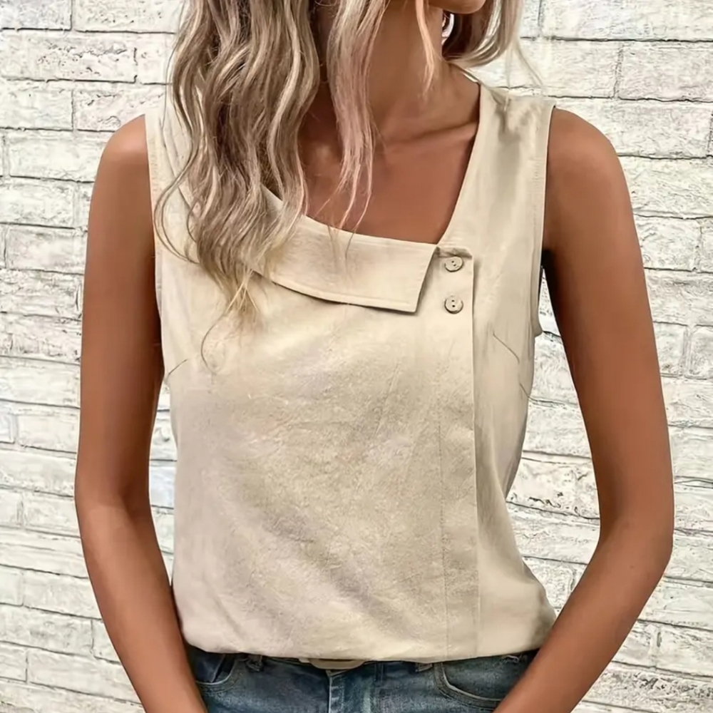 Elegant Asymmetrical Design With A 2 Button Folded Collar Design.